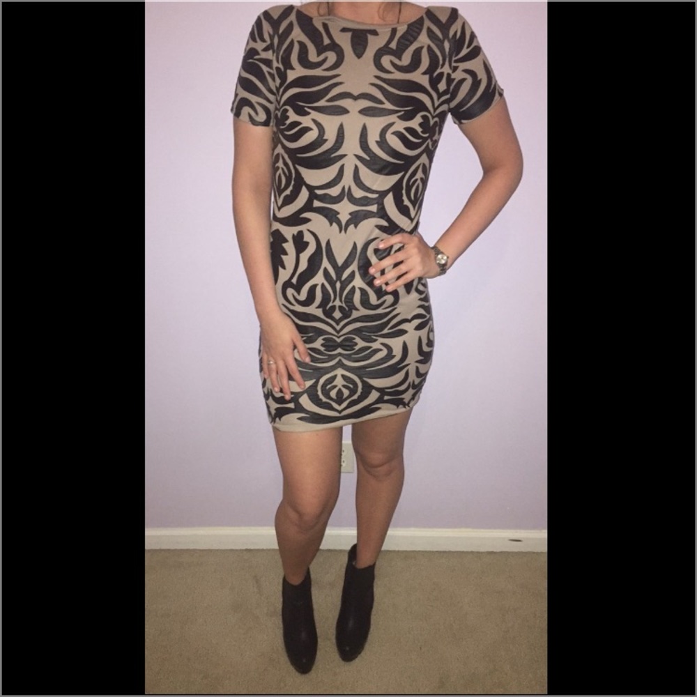 NWOT nude with faux leather designs