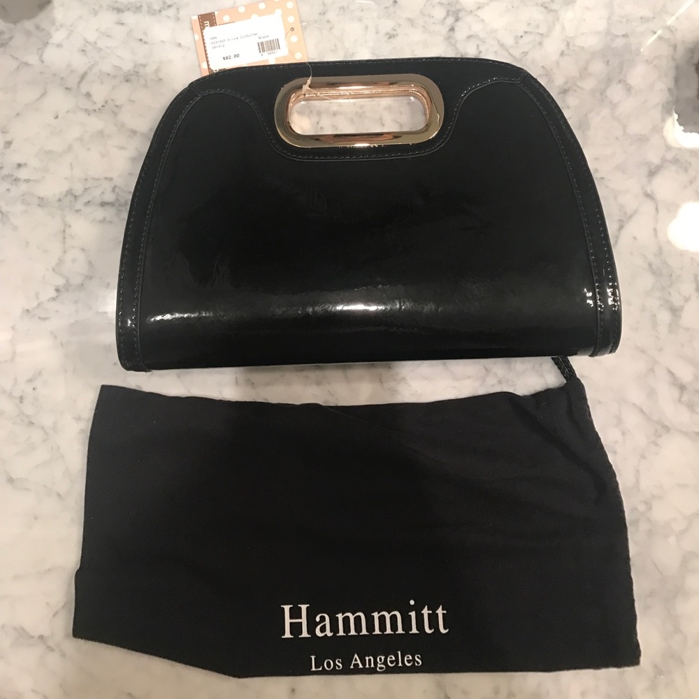 NWT black polished clutch