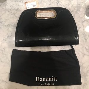 NWT black polished clutch