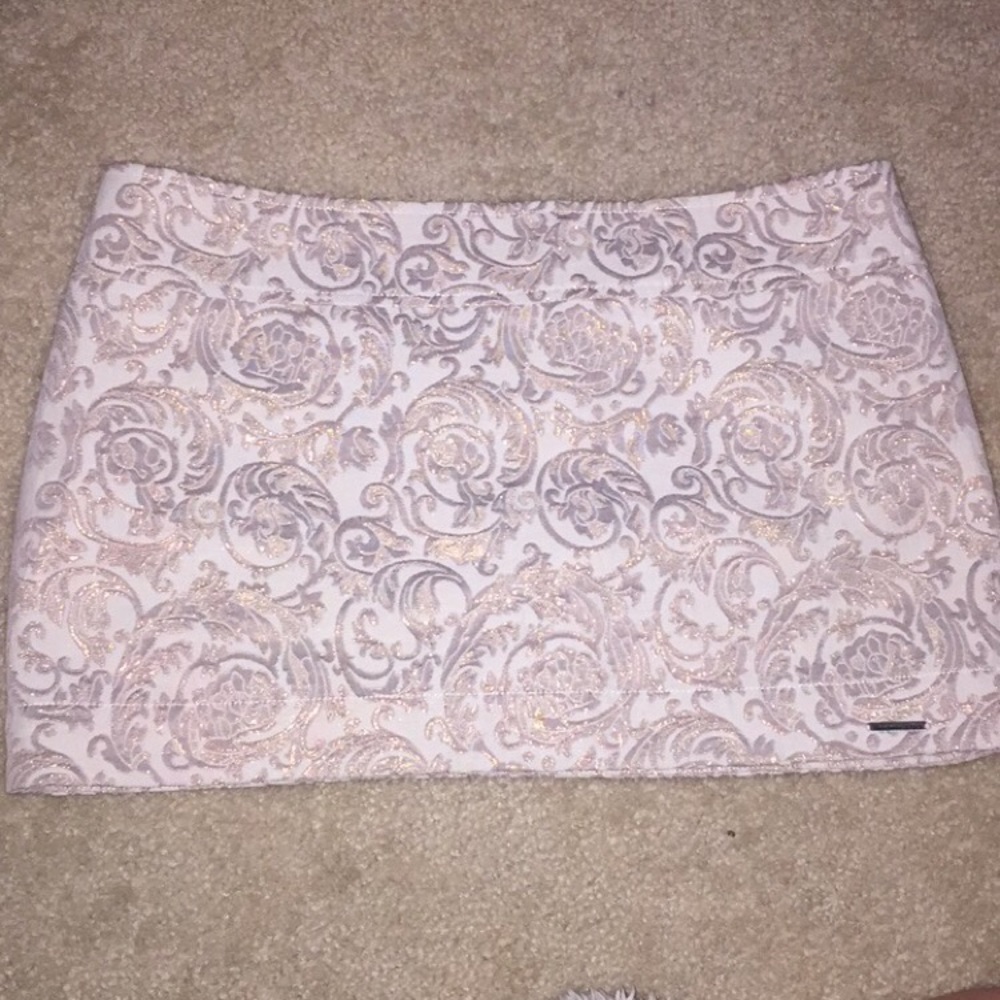 beige and gold design skirt