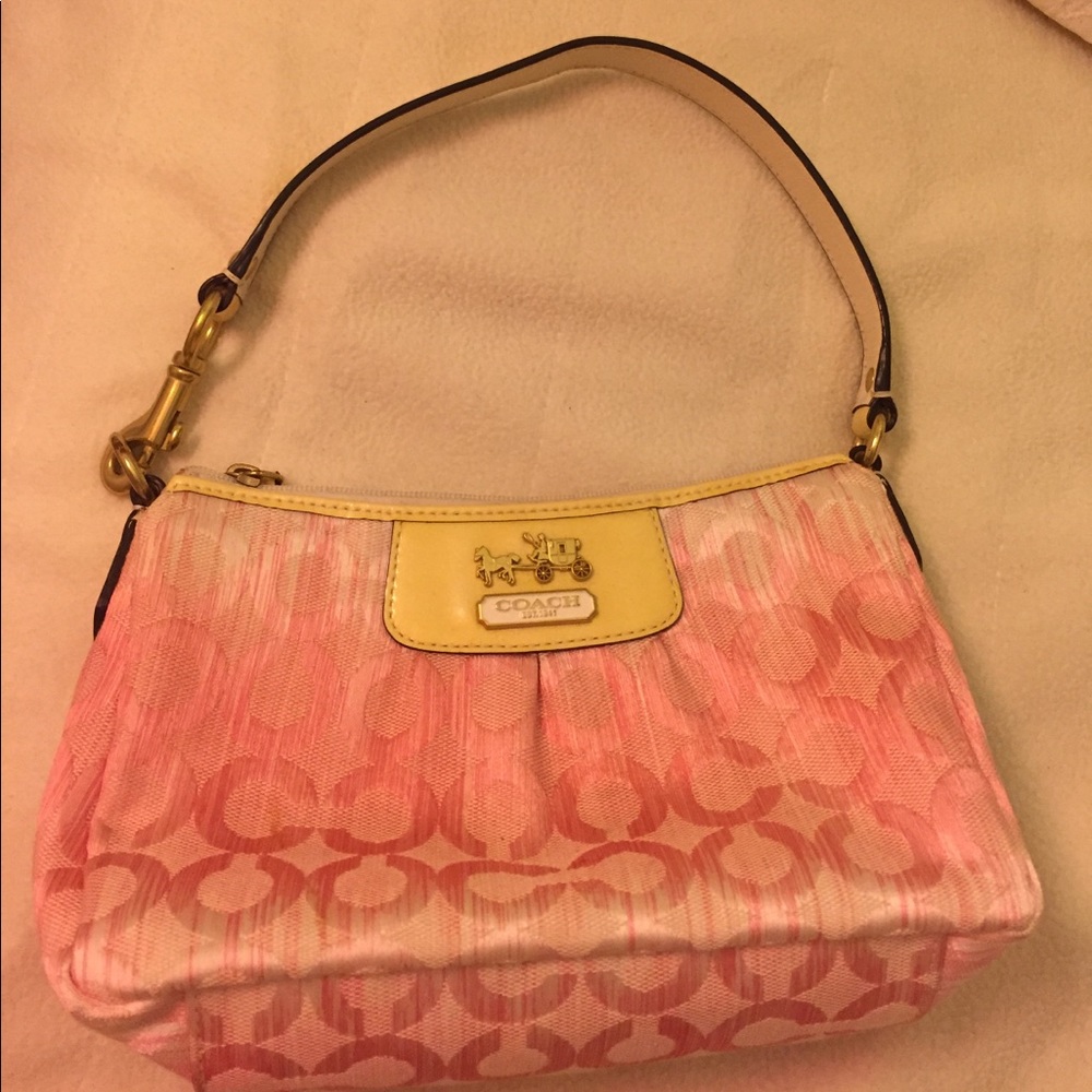 Light pink small coach brand purse never used