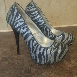 Silver and black heels
