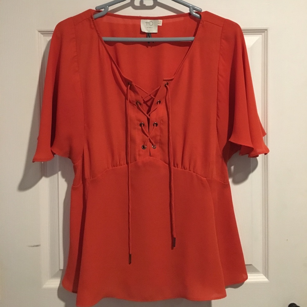 Anthropologie orange lace up shirt