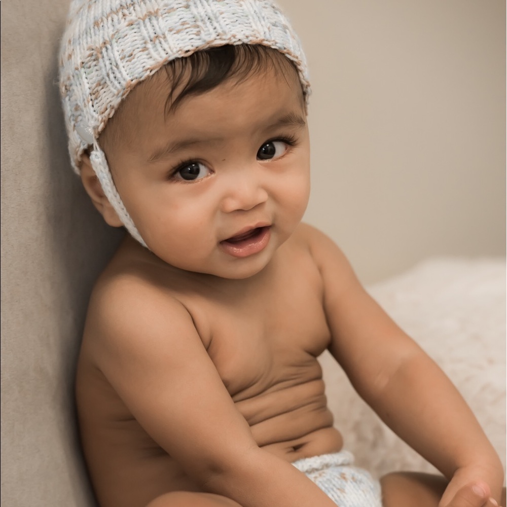 "Snow Angel" hand-knitted baby set.