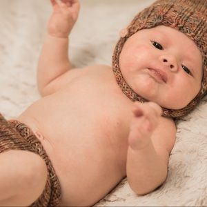 "Fall Cheer" hand-knitted baby set.