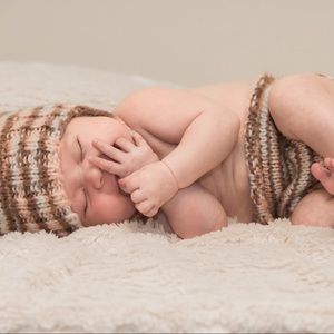 "Naturally Sweet" hand-knitted baby set.