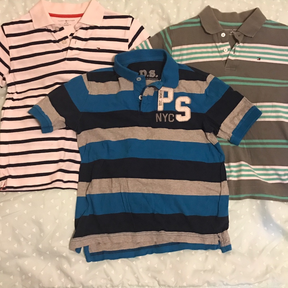Three used boy's short sleeve t-shirts.