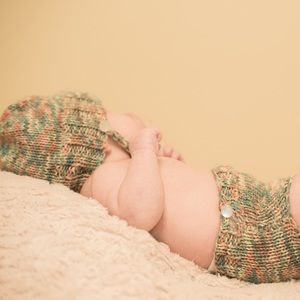 "Pumpkin Seed" hand-knitted baby set.