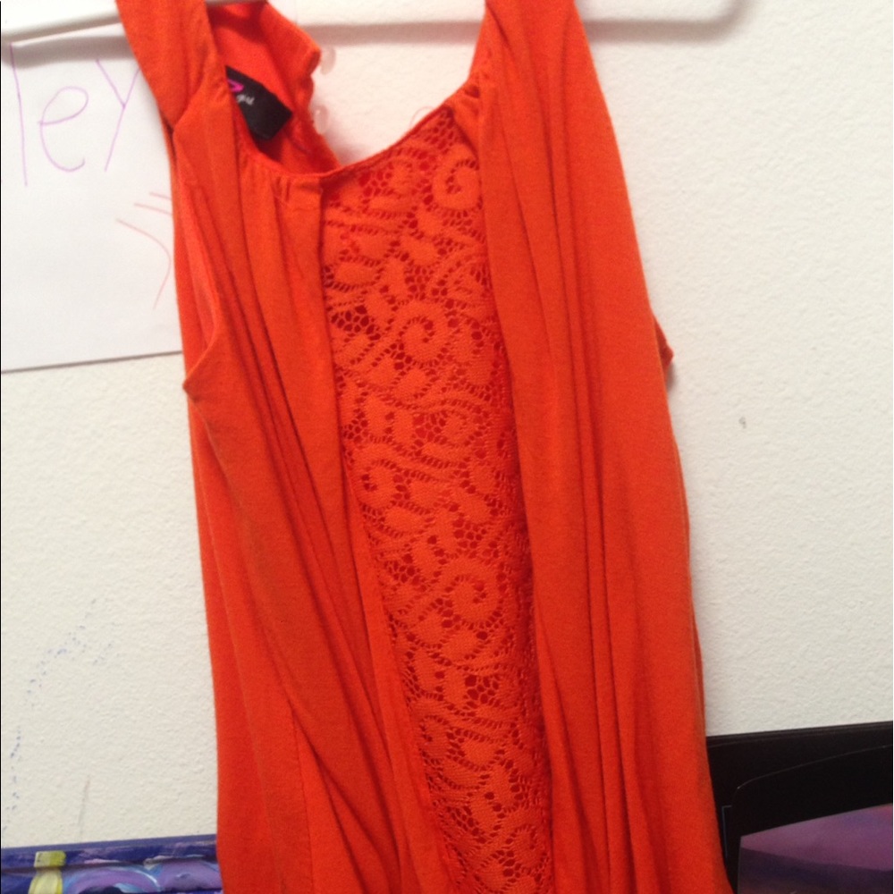 Orange Lace flowey blouse.