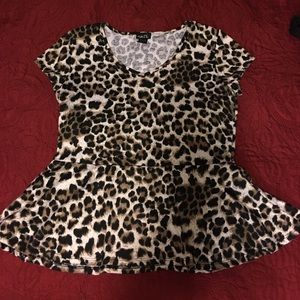 Leopard peplum top. Stretchy