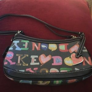 Never used Dooney and Bourke black alphabet purse