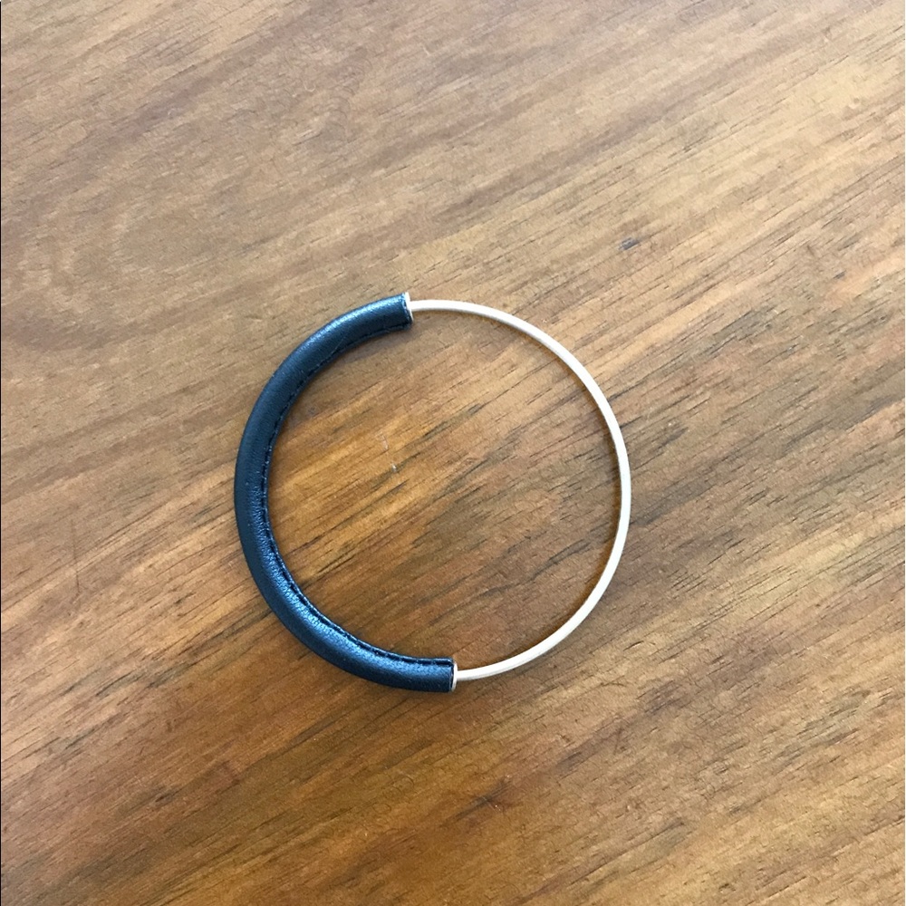 Chic and on trend COS bangle. Brass and leather.