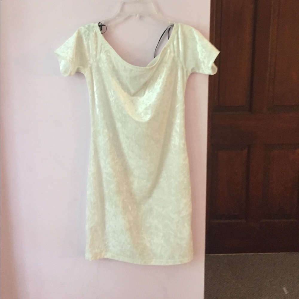 White velvet dress tags on