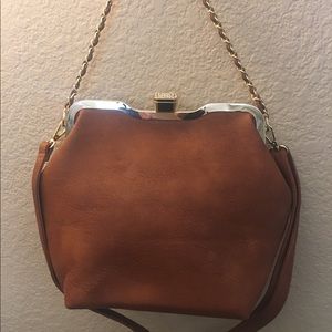 Purse with diamond studded clip