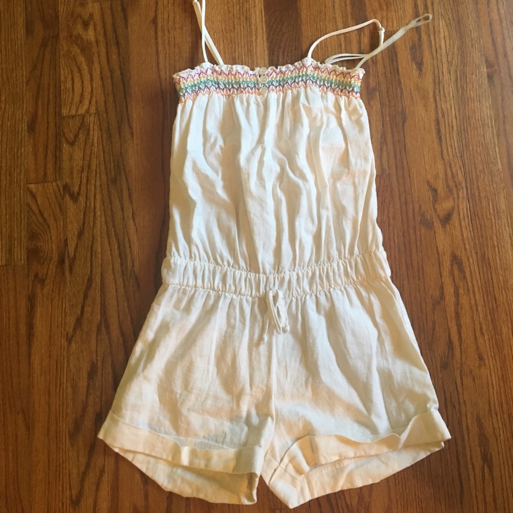 Never- worn, white romper with Aztec stitching!!