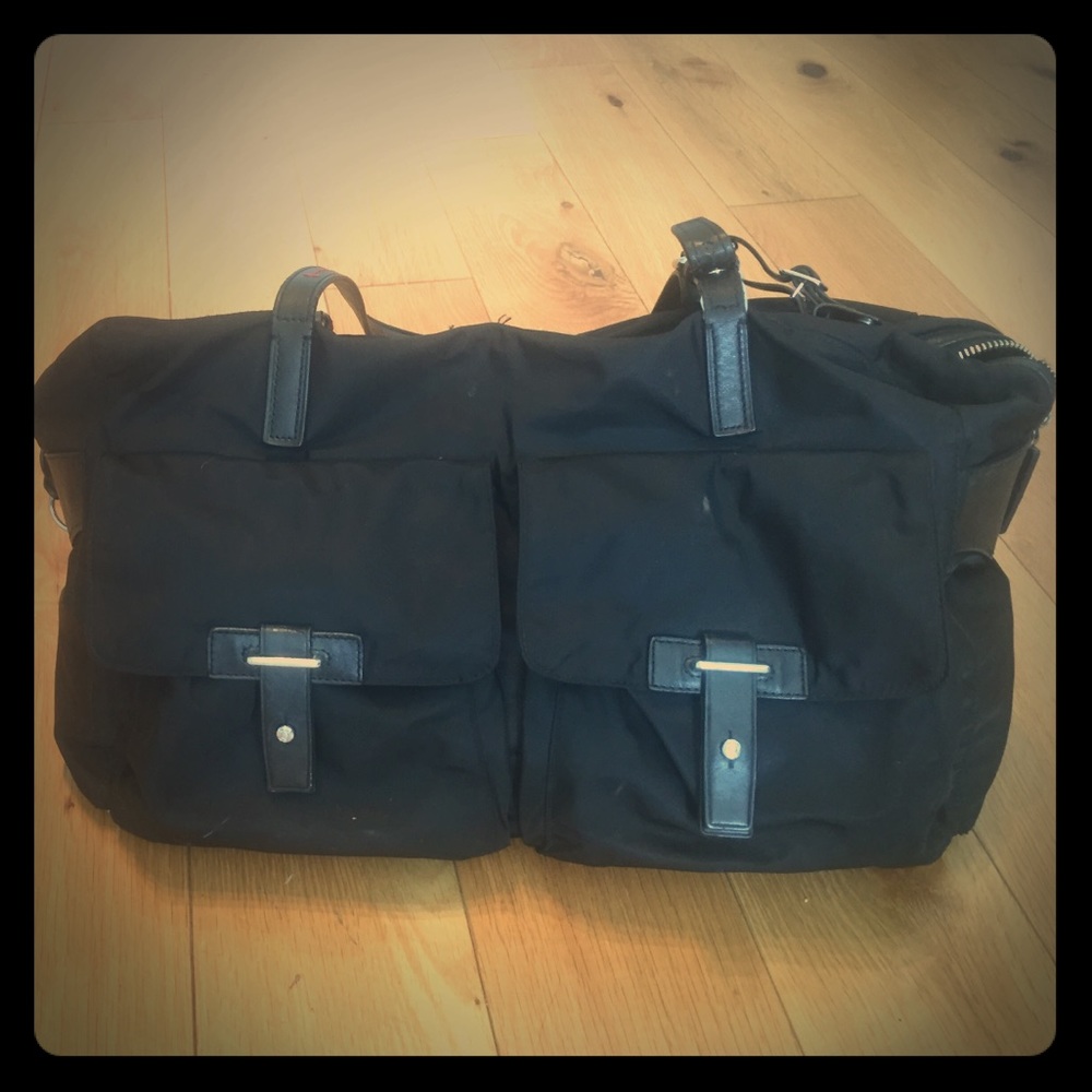 TUMI nylon carry on bag