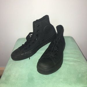 All black high top Converse