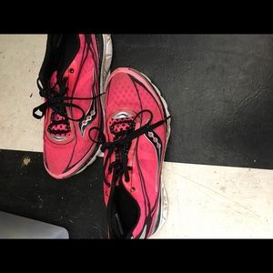 Pink Saucony running shoes