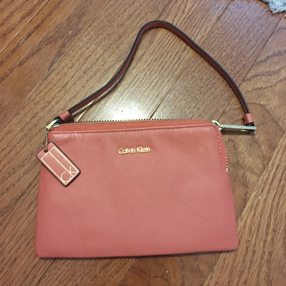 Pink Calvin Klein wristlet