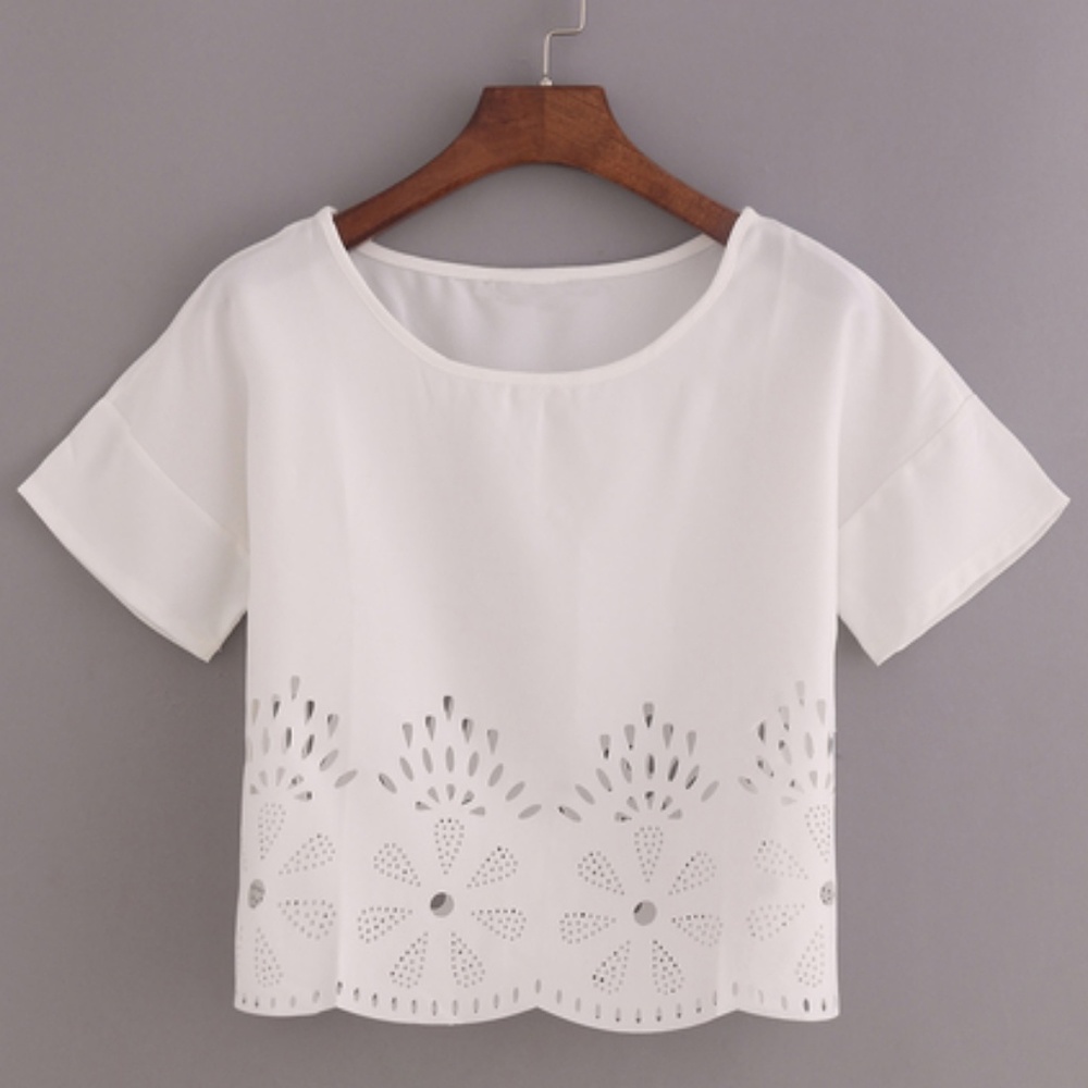 SOLD Laser cut loose fit off white top