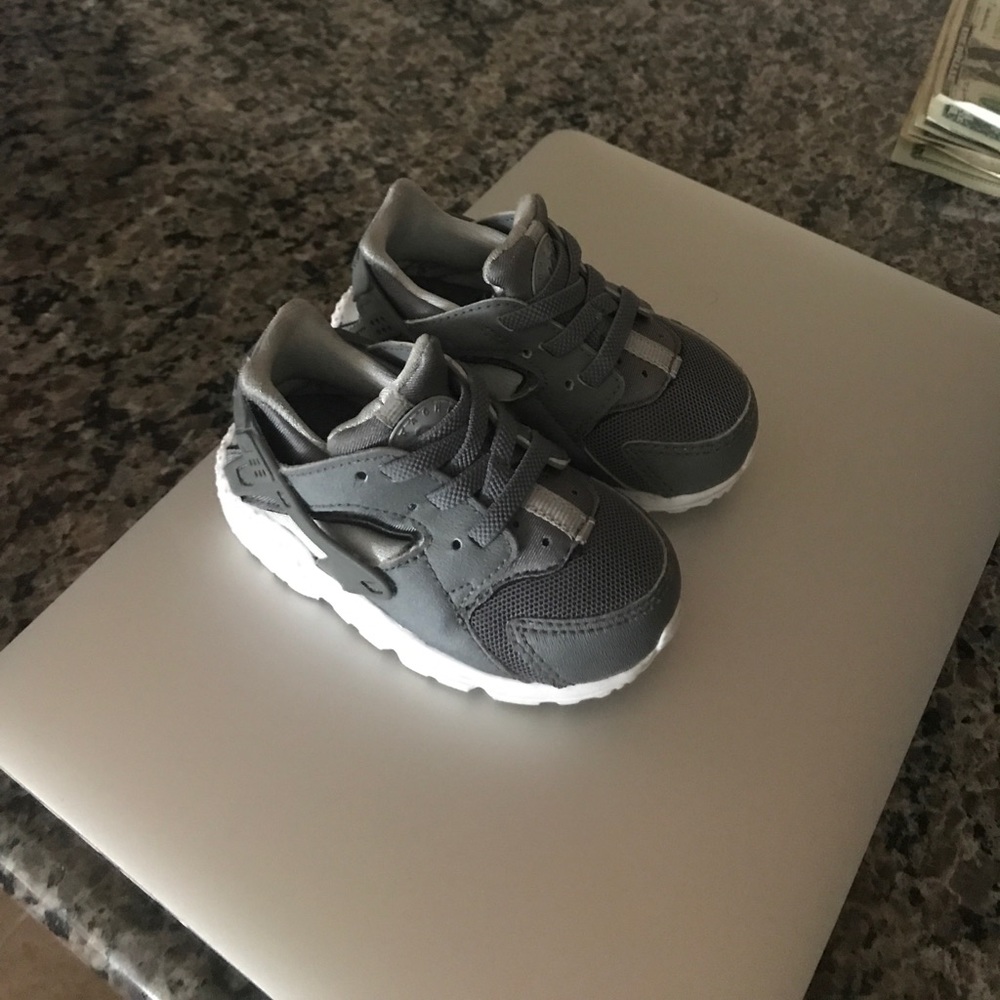 Gray Nike huaraches