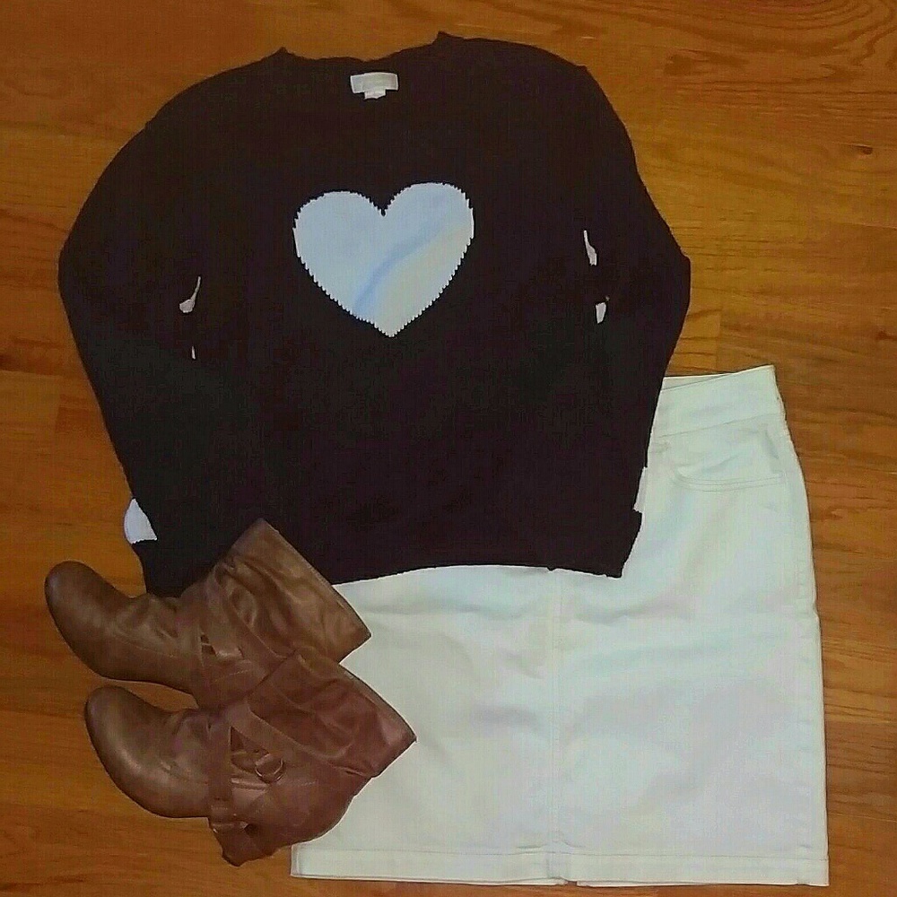 Navy blue sweater with white details