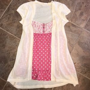 Pink polka dot top built into cream cardigan