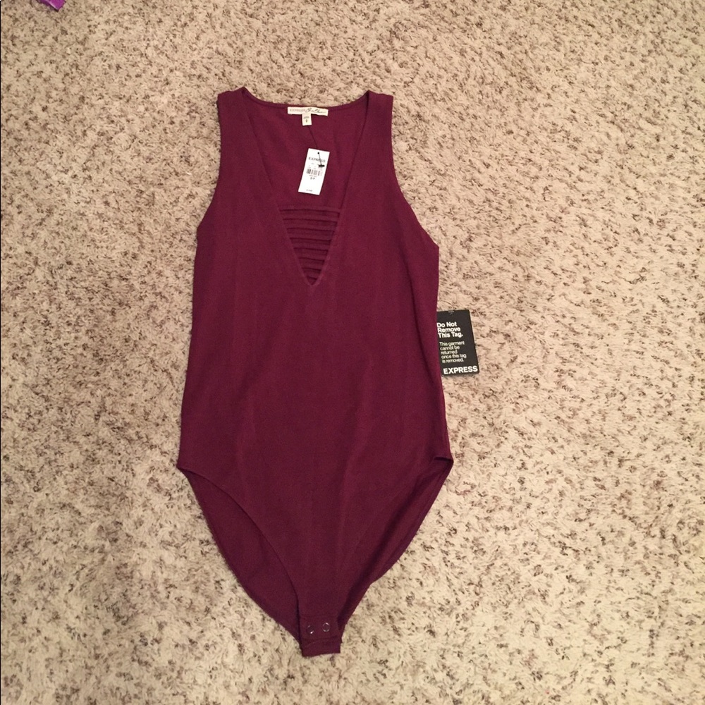 NWT Express body suit Medium available. Small sold