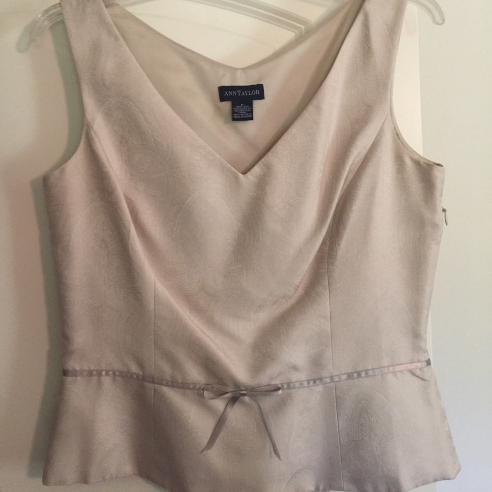 Silk v-neck peplum top. Neutral Oyster tone