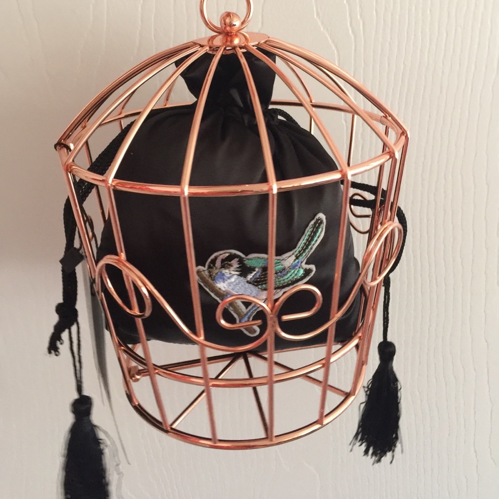 Unique Bird cage clutch