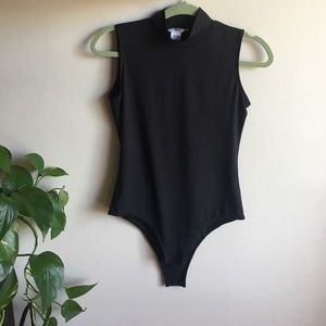 Sleeveless black bodysuit