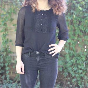Black flowy blouse with sheer sleeves
