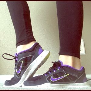 Black, purple and green Nike training sneakers