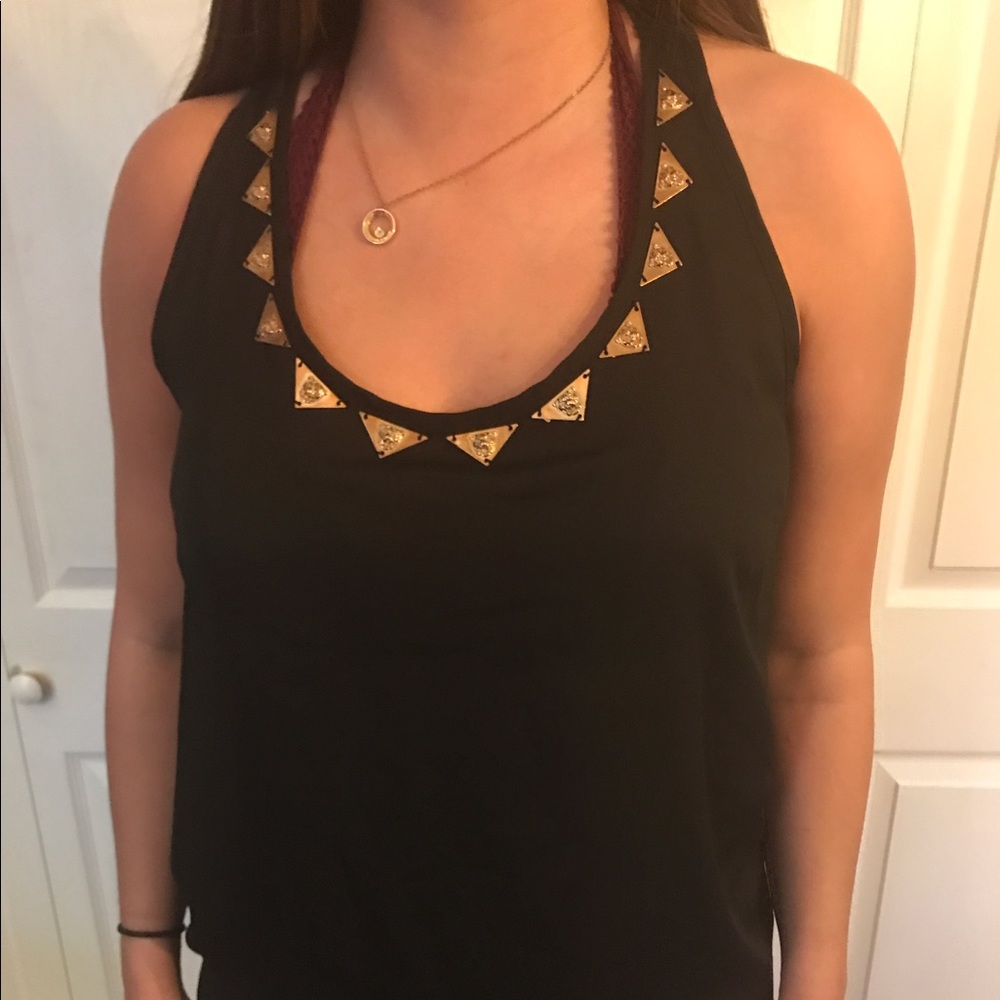 Sheer black tank top with gold detail