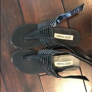 Black ladder-style sandals