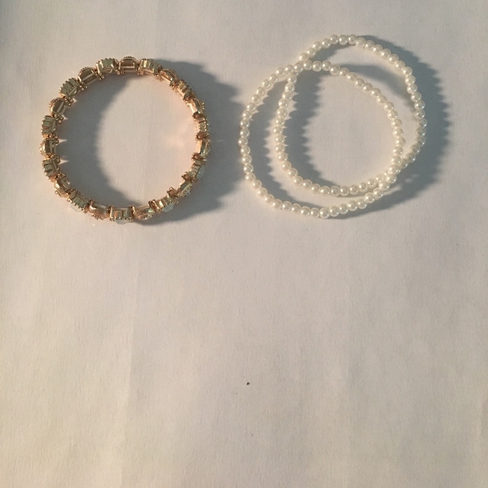 Francesca's collection of layering bracelets