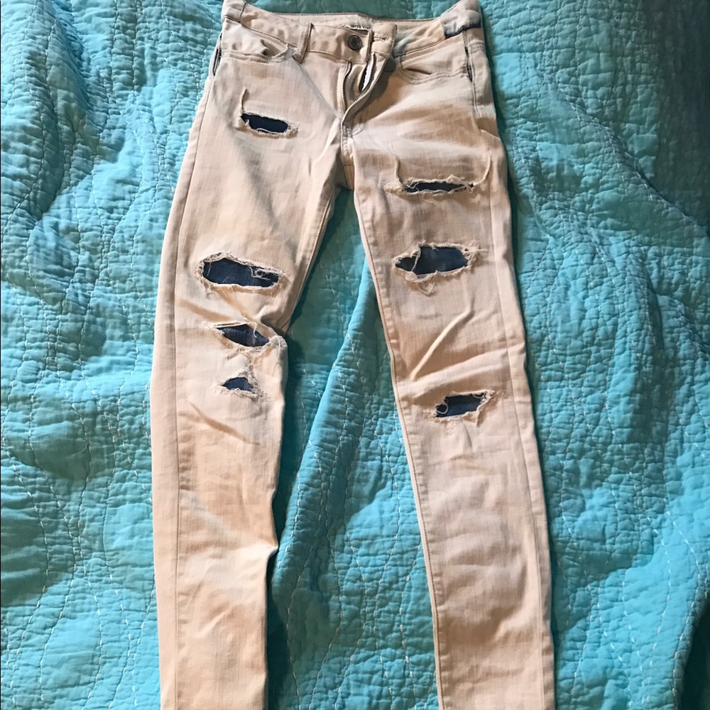 Destroyed style white jeans