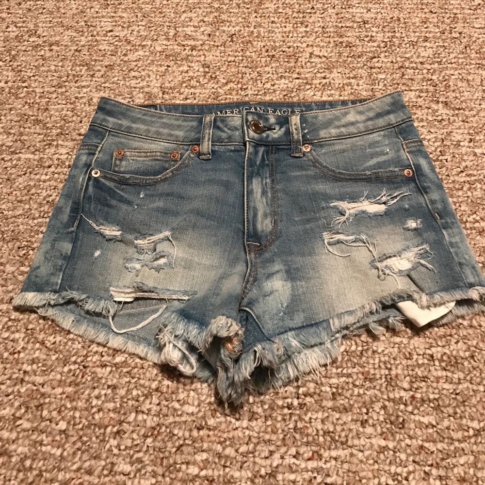 High waisted light colored jean shorts
