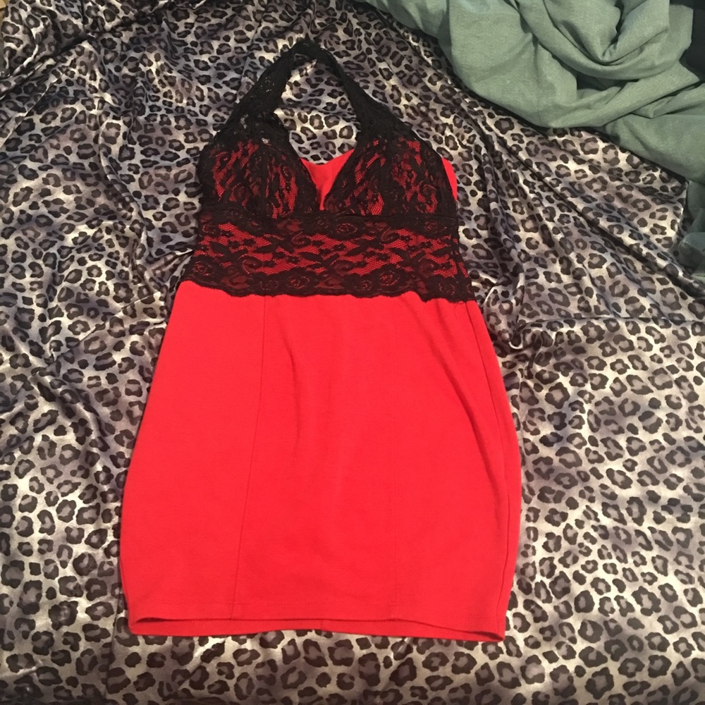 Reddish orange halter dress with black lace