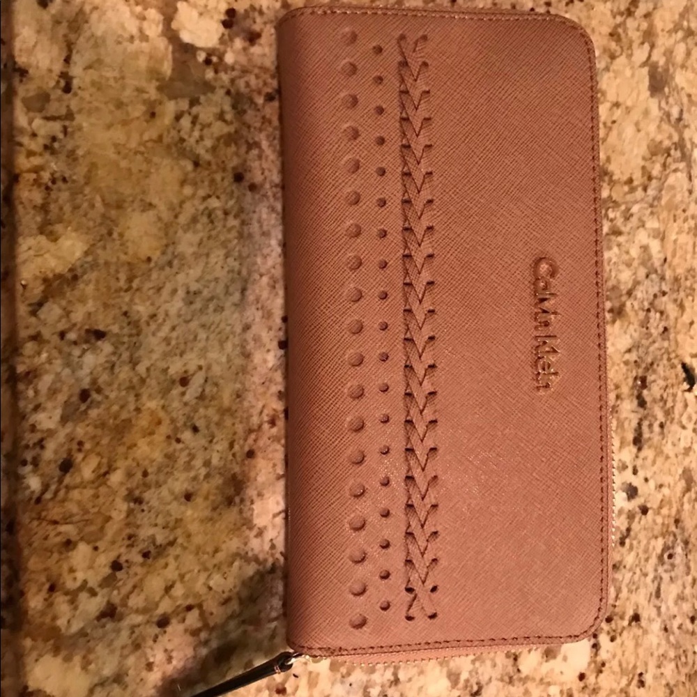 Calvin Klein wallet. Beige.New Never used