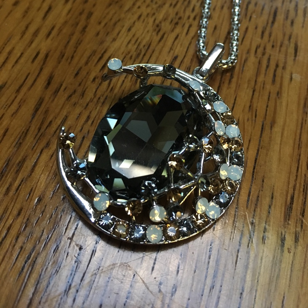 Moon shaped pendent with Crystals