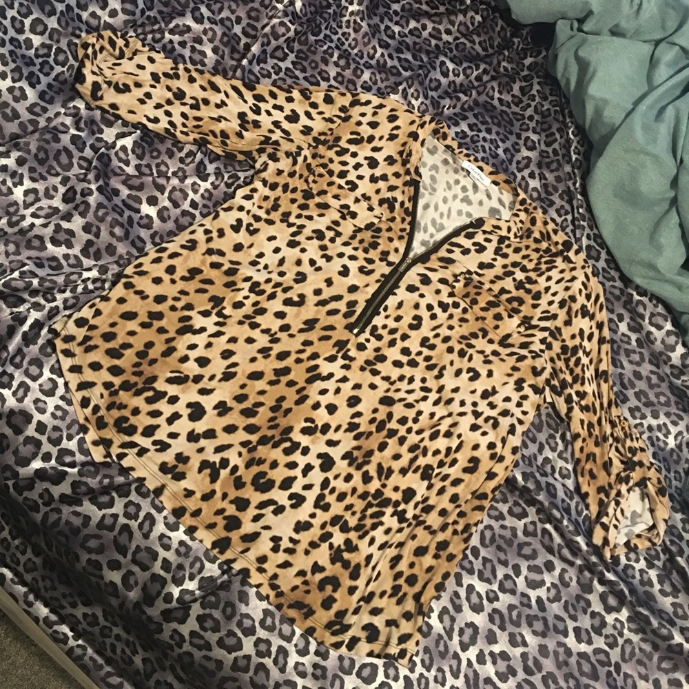 Calvin Klein cheetah print with gold