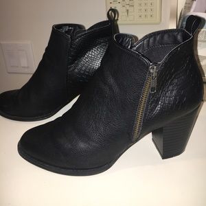 Barely worn, black booties with snakeskin details
