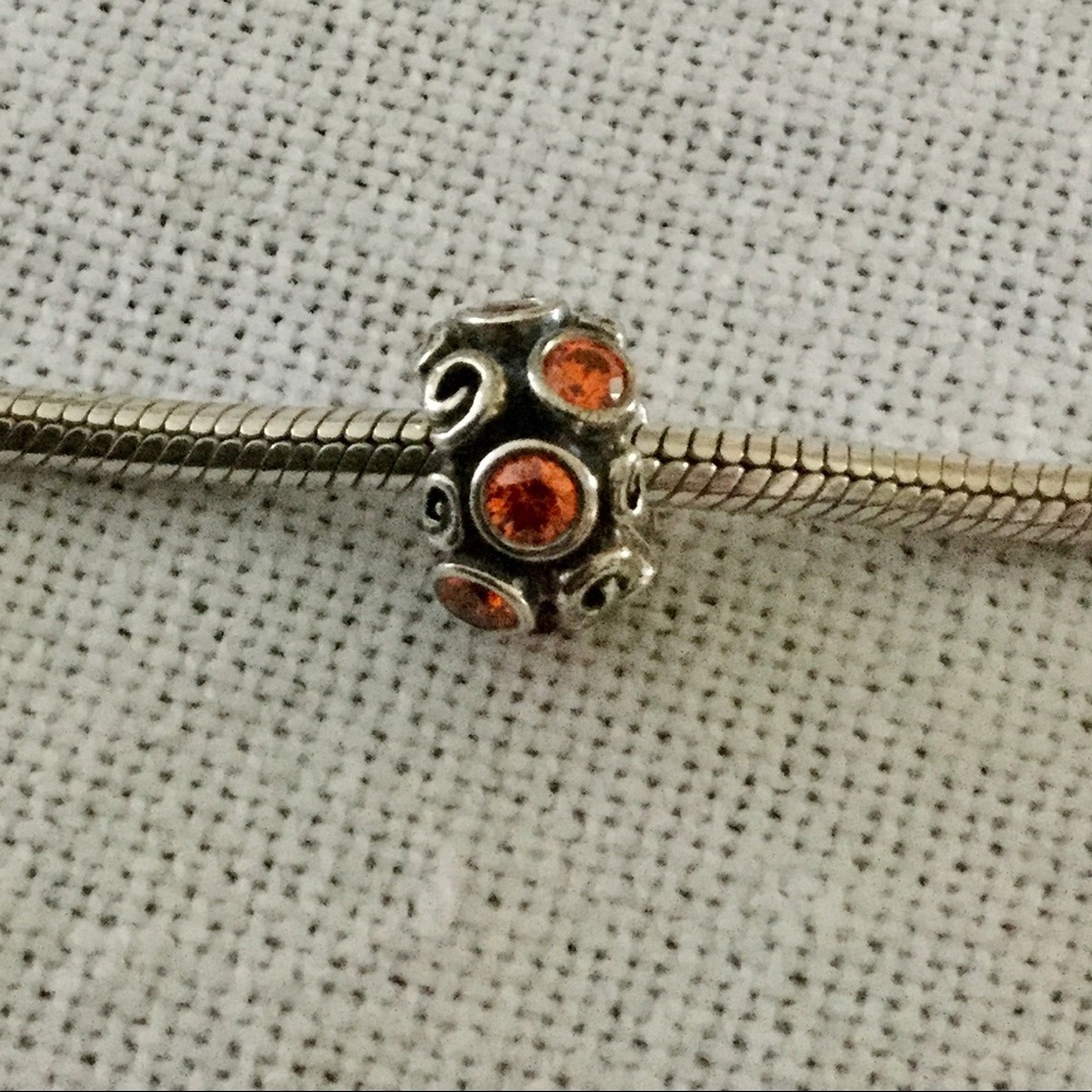 🌸RETIRED Pandora 925 SS Charm w/orange CZs