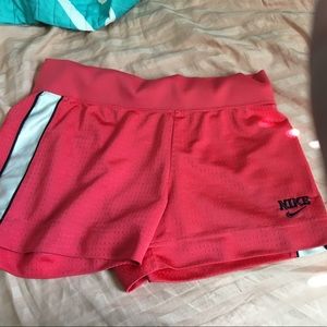 Pink and white athletic shorts