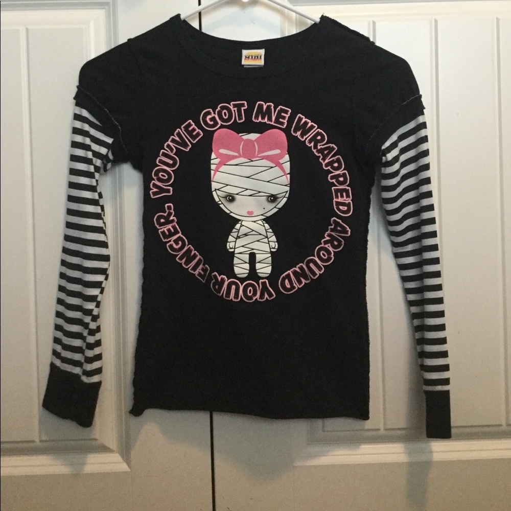 Glow in the dark black mummy long sleeve shirt.