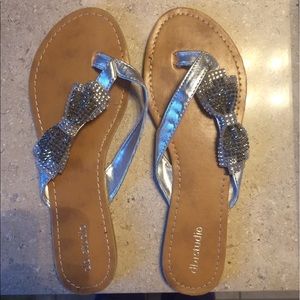 Silver flip flop sandals