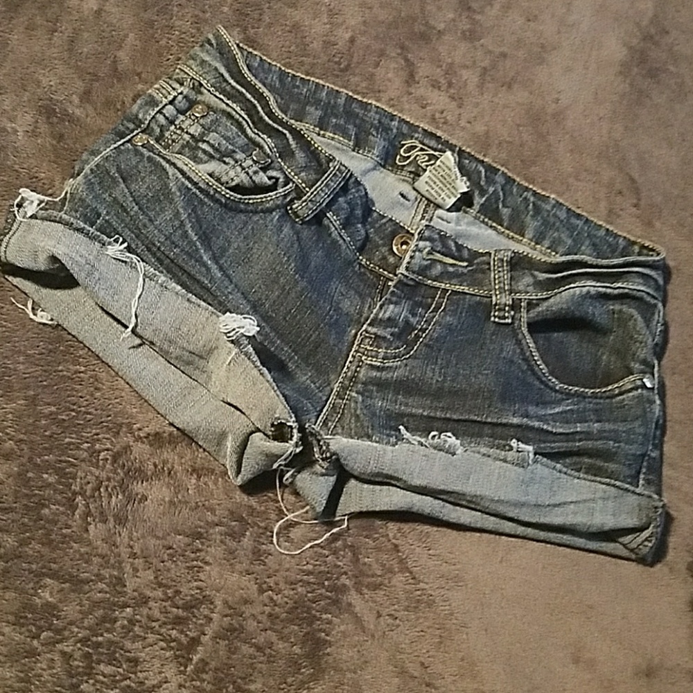 Destroyed denim shorts