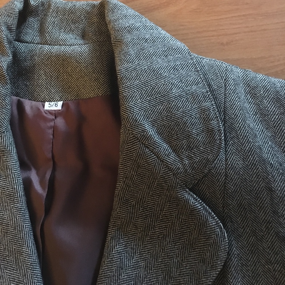 Beautiful herringbone blazer, fully lined.