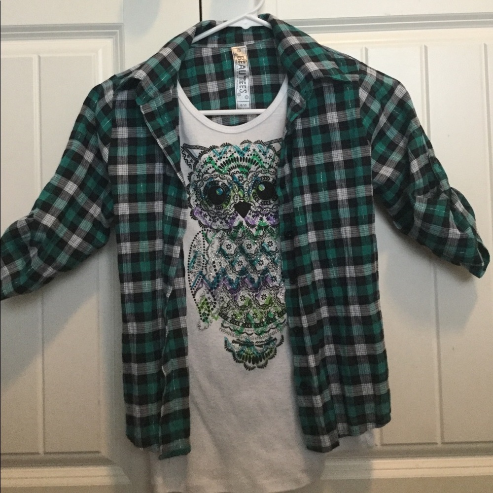 Green, black, white plaid shirt with owl in middle